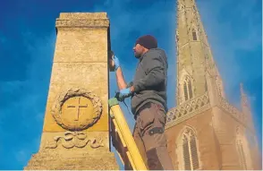  ?? ?? Master stonemason Steve Hancock putting the finishing touches to the makeover of Braunston’s war memorial.