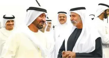  ?? Arshad Ali/Gulf News ?? Shaikh Hamdan Bin Rashid Al Maktoum, Deputy Ruler of Dubai and Minister of Finance, talks to trainer Doug Watson and Jim Crowley during the World Cup meeting. Shaikh Nahyan Bin Mubarak Al Nahyan, Minister of Culture and Knowledge Developmen­t and Shaikh...