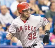  ?? Steve Nesius Associated Press ?? FOR THE Angels to succeed next season, Josh Hamilton needs to bounce back and provide slugging.
