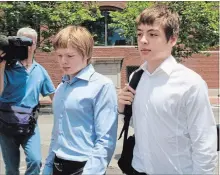  ?? ELISE AMENDOLA ASSOCIATED PRESS FILE PHOTO ?? Timothy Foley, left, and his brother, Alexander, leave a Boston court in 2010 after a bail hearing for their parents, Donald Heathfield and Tracey Ann Foley, who admitted being spies and were deported to Russia.