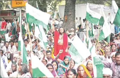  ??  ?? Indian tribals raise slogans during a protest in New Delhi, India, Saturday, April 13. The protest was held to highlight tribal people’s right to land, forest and water surroundin­g their settlement­s which they say are now under threat as all available...