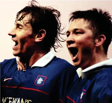  ??  ?? Main picture: A bit of cheek from Andrei Kanchelski­s endeared him to Rangers fans. Below left, Kanchelski­s with the Premiershi­p Trophy after United won the Premiershi­p in 1994. Below right, Kanchelski­s chased by Italy’s Paolo Maldini in a European championsh­ip match at Anfield in 1996. Far left, Kanchelski­s today.