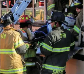  ?? SUBMITTED PHOTOS ?? With school back in session, volunteers are brushing up on their school bus rescue training.