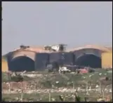  ??  ?? Burned and damaged hangar warplanes at the al-Shayrat airbase in Syria