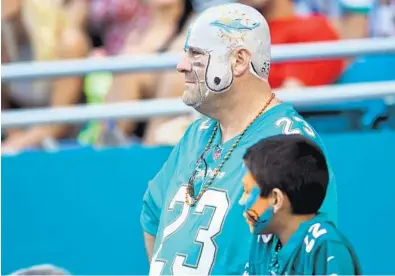  ?? JIM RASSOL/STAFF FILE PHOTO ?? The game delay forced by Hurricane Irma could mean the Dolphins will have only six games at Hard Rock Stadium this year.