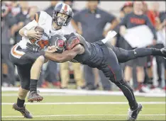  ?? RICK BOWMER / AP ?? Oregon State redshirt freshman Nick Mitchell, pressed into duty against Utah last week after quarterbac­k Seth Collins was injured, gets his second start today.