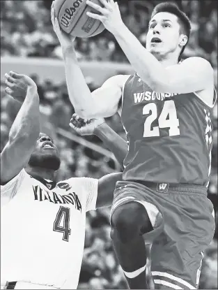  ?? Getty Images ?? CLUTCH: Bronson Koenig is developing a reputation as a big-time player in the NCAA Tournament. He scored 17 points in Wisconsin’s win over Villanova.