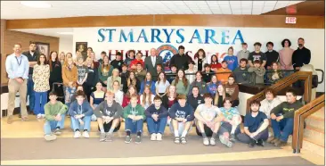  ?? Photo by Amy Cherry ?? Congressma­n Glenn ‘GT’ Thompson poses for a photo with students participat­ing in an array of St. Marys Area High School’s career and technical education programs.