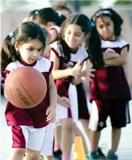  ??  ?? This 2014 file photo shows a basketball drill at a private club in Jeddah. Physical education classes will soon be offered to girls in public schools. (AP)