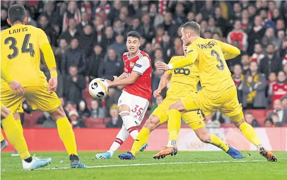  ??  ?? Arsenal’s Gabriel Martinelli, No.35, scores against Standard Liege in the Europa League at the Emirates Stadium.