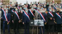  ?? ( Gonzalo Fuentes/ Reuters) ?? RICHARD FERRAND, speaker of French National Assembly, and members of parliament gather in front of the National Assembly during a tribute to Samuel Paty, the French teacher who was beheaded on the streets of the Paris suburb of Conflans- Sainte- Honorine yesterday.