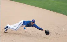  ?? GETTY IMAGES/ FILES ?? Matt Hague of the Toronto Blue Jays, seen trying to make a play during spring training, has been a star in Triple- A.