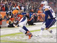  ?? JACK DEMPSEY/THE ASSOCIATED PRESS ?? Denver wide receiver Andre Caldwell (12) hauls in a touchdown pass late in the fourth quarter of the Broncos’ win.