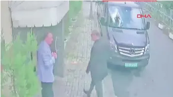  ?? — AFP file photo ?? File video grab from CCTV footage obtained from Turkish news agency DHA shows Khashoggi (right) arriving at the Saudi Arabian consulate in Istanbul.