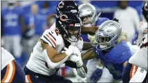  ?? DUANE BURLESON — THE ASSOCIATED PRESS ?? Chicago Bears running back David Montgomery (32) rushes during the first half of a game earlier this year against the Detroit Lions,