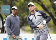  ?? Eric Gay / Associated Press ?? Lucas Bjerregaar­d watches his drive on hole No. 8.