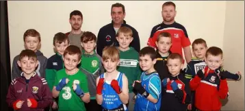  ??  ?? St. Aidan’s Boxing Club, Ferns, pictured with their coaches, Derek Thorpe, Mick Delaney and Johnny Dwyer.