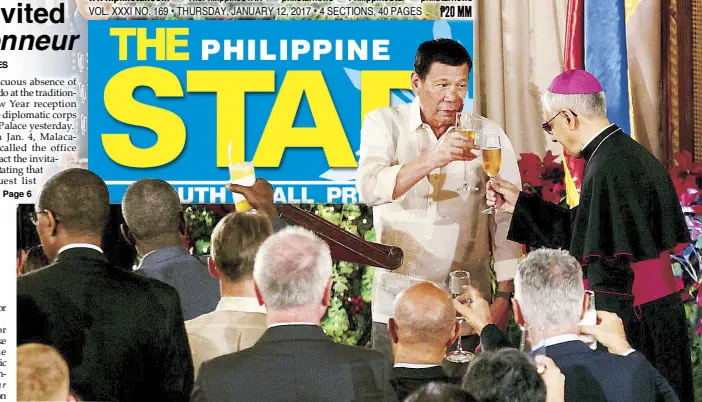  ??  ?? TO OLD ALLIANCES, NEW FRIENDSHIP­S: President Duterte raises his glass for a toast with the diplomatic corps led by Papal Nuncio Giuseppe Pinto during the vin d’honneur at Malacañang yesterday. The President vowed to pursue ‘constructi­ve alliances and...
