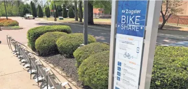  ??  ?? Racks for Germantown's Zagster bike share program, which launches Thursday, are in place at the Germantown Athletic Club. RON MAXEY/THE COMMERCIAL APPEAL