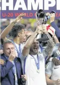  ??  ?? Paul Simpson (left) and England celebrate winning the Under-20 World Cup in South Korea