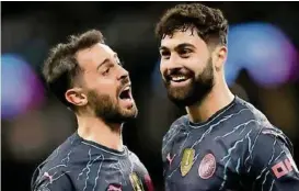  ?? ?? Bernardo Silva i Joško Gvardiol, fudbaleri Cityja