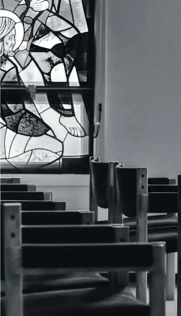  ??  ?? Sister Adrianne Charanduk, 90, counts the rosary in the chapel at the Sisters Servants of Mary Immaculate convent in Mundare, Alta.