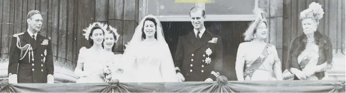  ??  ?? Wedding day at Buckingham Palace: King George VI, Princess Margaret, Lady Mary Cambridge, Elizabeth, Philip, Queen Elizabeth (later Queen Mother) and Queen Mary