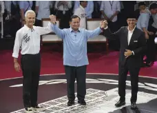  ?? AFP; Reuters; AP ?? Top, Indian Prime Minister Narendra Modi is expected to win another term; left, Donald Trump wants to return to power in the US; above, from left, Ganjar Pranowo, Prabowo Subianto and Anies Baswedan will run in Indonesia