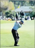  ?? JEFF GROSS/ GETTY IMAGES NORTH AMERICA/AFP ?? Tiger Woods plays his second shot on the 11th hole during the second round of the Farmers Insurance Open at Torrey Pines North on January 27.