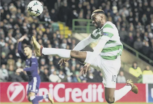  ??  ?? 0 Celtic striker Moussa Dembele at full stretch against Anderlecht. Despite losing 1-0 Celtic will take their place in Monday’s draw for the Europa League last 32.