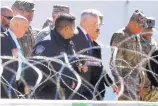  ?? JOEL MARTINEZ/THE MONITOR/ASSOCIATED PRESS ?? Sec. of Defense Jim Mattis and Homeland Security Sec. Kirsten Nielsen, third from the right, visit Base Camp Donna, in Donna, Texas, recently.