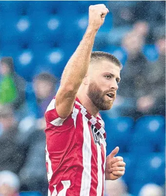  ?? ?? Shaun Rooney celebrates after giving Saints the lead.