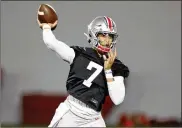  ??  ?? Ohio State quarterbac­ks (from left) Kyle McCord, C.J. Stroud and Jack Miller III are in a three-way battle to succeed Justin Fields as the lead signal-caller. Today’s Spring Game will be an important data point in that battle.
