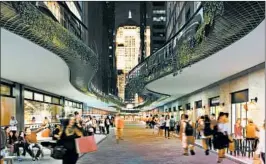  ?? FRANK BOTELLO ?? Nightlife is shown on a reimagined lower LaSalle Street. Renderings by Frank Botello imagine pathways that hug building facades and run the length of the street’s canyon.