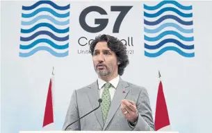  ?? ADRIAN WYLD THE CANADIAN PRESS ?? Prime Minister Justin Trudeau said on Sunday at the G7 Summit that Canada will also pay for the purchase and distributi­on of 87 million doses through the ACT-Accelerato­r program.