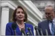  ?? ALEX BRANDON — THE ASSOCIATED PRESS ?? House Speaker Nancy Pelosi speaks to reporters outside the White House on Wednesday as Senate Minority Leader Chuck Schumer looks on.