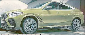  ??  ?? ‘ Mzoro’s ( R) dream BMW X6. c ar i s a