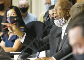  ?? JOHN SMIERCIAK/POST TRIBUNE ?? Councilman Charlie Brown admonishes a protester for yelling out during a discussion and vote by the Lake County Council on a school mask mandate order the Lake County health officer had proposed on Sept. 14, 2021.