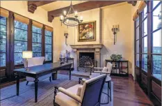  ?? Jeff elson / tns ?? KISS lead guitarist tommy thayer has listed his customized home overlookin­g Lake Sherwood, Calif., for $2.75 million. the mediterran­ean villa-style house makes good use of the scenery with six separate patios. inside, picture windows take in the view.