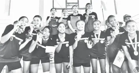  ??  ?? The Central Visayas girls futsal squad pose after winning the gold medal by beating National Capital Region, 10-2, in the 61st Palarong Pambansa yesterday in Sta. Catalina, Ilocos Sur.