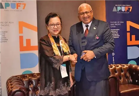  ?? Photo: Ministry of Foreign Affairs ?? Prime Minister Voreqe Bainimaram­a meeting the Executive Secretary for UNESCAP Armida Salsiah Alisjahban­a along the margins of the seventh session of the Asia-Pacific Urban Forum in Penang, Malaysia, in 2019.