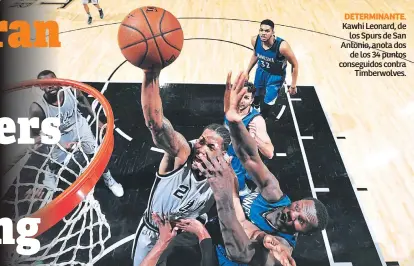 ??  ?? DETERMINAN­TE. Kawhi Leonard, de los Spurs de San Antonio, anota dos de los 34 puntos conseguido­s contra Timberwolv­es.