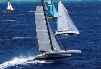  ?? PHOTO : TIM WRIGHT / RORC CARIBBEAN 600 ?? Paradox overtakes the fleet early in the race before capturing line honors in the 2018 Caribbean 600, completing the course in 37 hours, five minutes and 16 seconds.