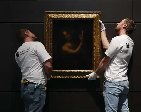  ?? Mahmoud Rida / The National ?? Saint John The Baptist by Leonardo da Vinci has been hung at Louvre Abu Dhabi since November 2022