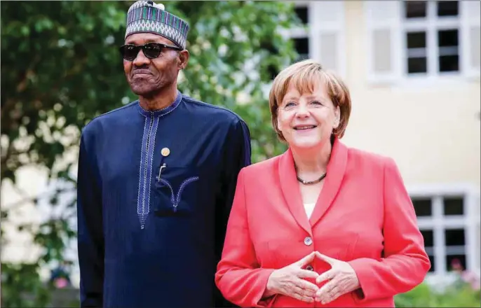  ??  ?? President Muhammadu Buhari and German Chancellor Angela Merkel at the Working Session of The G7 Outreach Programme In Schloss Elmau, Germany in 2015