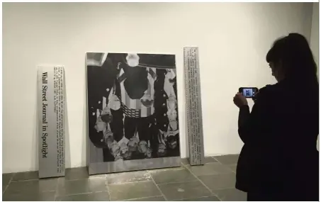  ?? — AFP ?? Thought provoking: A woman taking a photo of ‘Untitled’ ( Vince Foster 1994) by Cady Noland during an exhibition at the Met Breuer, Metropolit­an Museum of Art in New York.