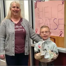  ?? Courtesy photo ?? Ace Sampson, a kindergart­en student at Brockbank Elementary in Spanish Fork, was inspired to start a fundraiser that helped the school raise almost $3,000 for cancer research.