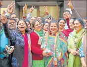  ??  ?? Congress’ Poonam Umat with supporters after filing her nomination papers for MC polls at the SDM office in Amritsar. SAMEER SEHGAL/HT