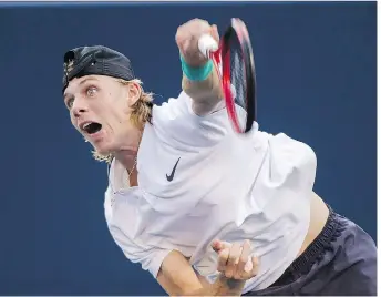  ?? NATHAN DENETTE/THE CANADIAN PRESS ?? Denis Shapovalov serves against Robin Haase, of the Netherland­s, during Rogers Cup action in Toronto earlier this month. Shapovalov heads into his second U.S. Open next week.