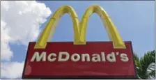  ?? ASSOCIATED PRESS FILE ?? This Tuesday, June 28, photo shows a McDonald’s sign in Miami. McDonald’s reported its shares had their biggest one-day percentage decline since the financial crisis.